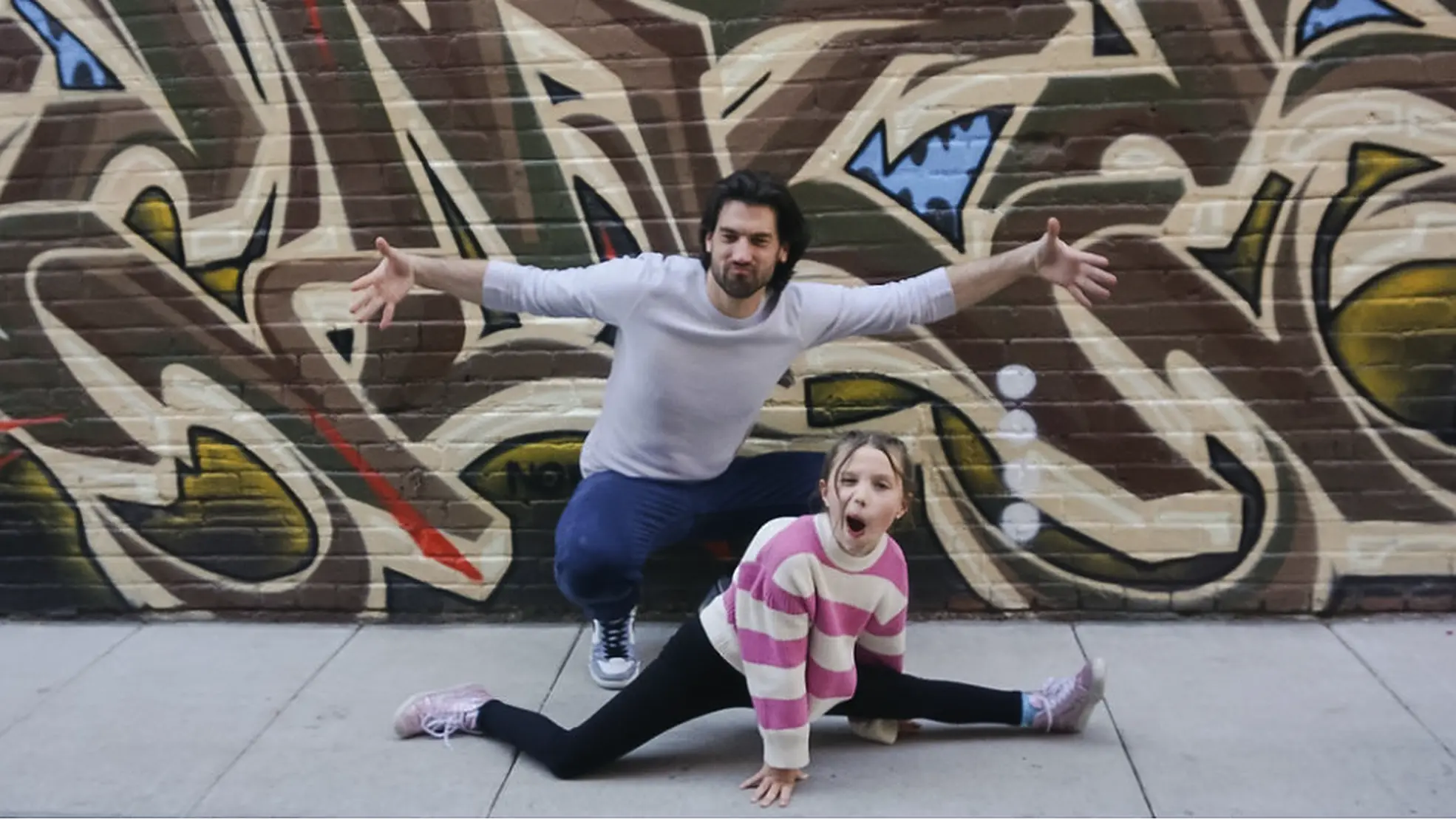 Brad Stolp and his daughter sharing a playful moment